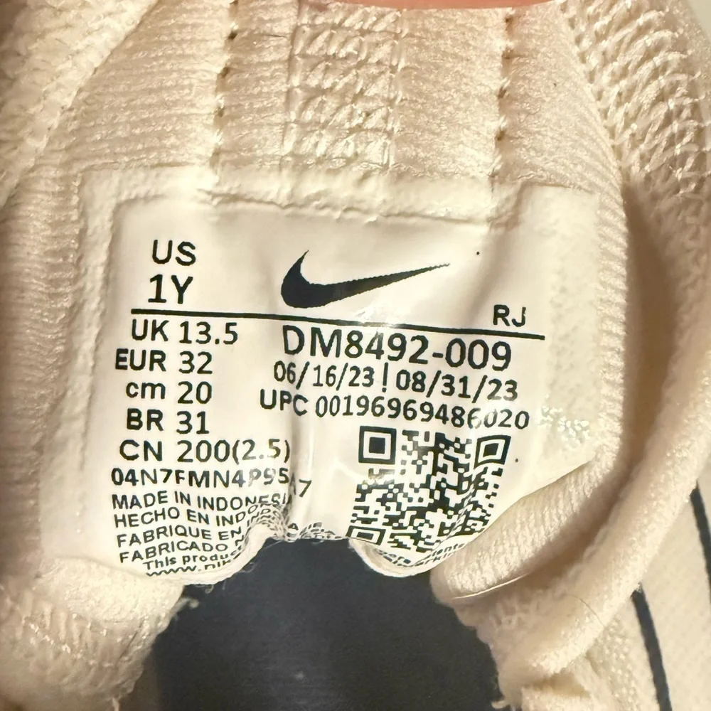Nike Kids White and Black Sneakers with Pink Accents